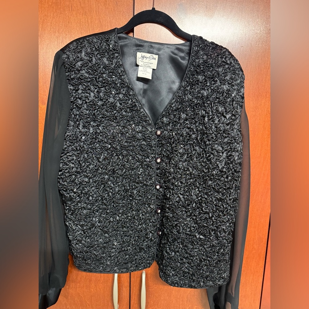 Textured Black top with Rhinestone buttons and with Sheer Sleeves